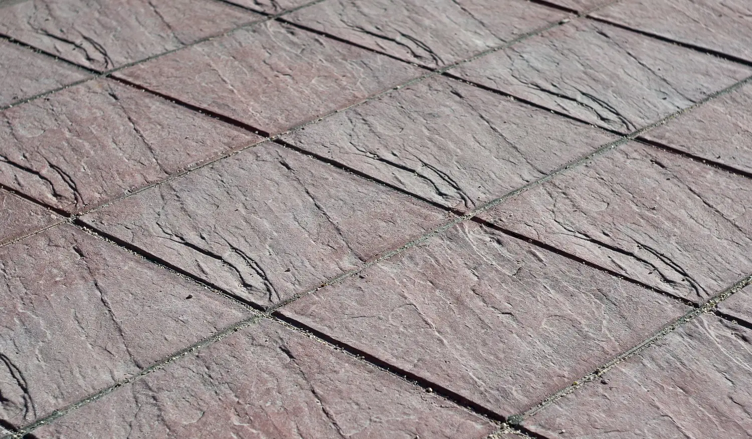 Close-up of a stamped decorative concrete stone pattern