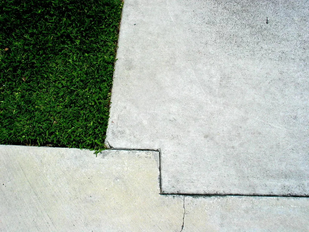 Concrete panel that has dropped at a joint